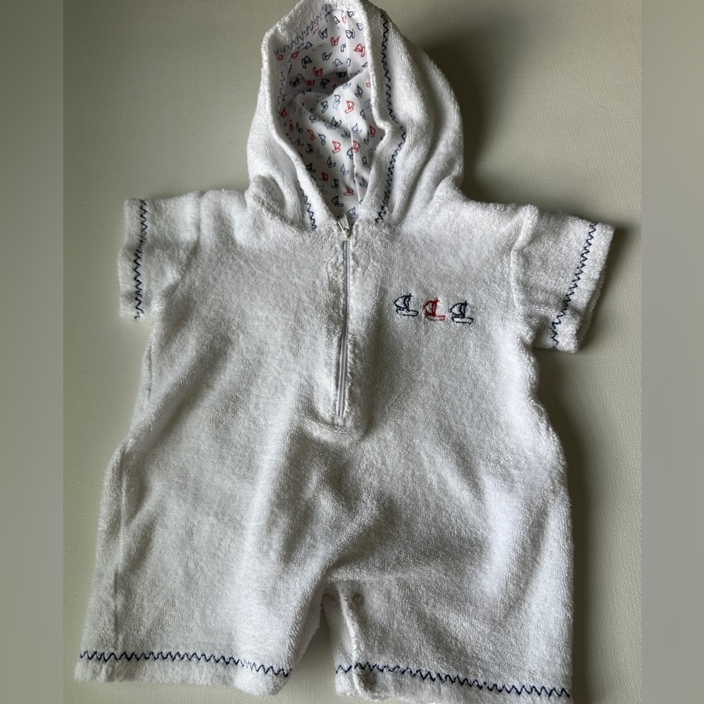 Kissy kissy baby boy coverups color white, short sleeves.  Size 6-9M.